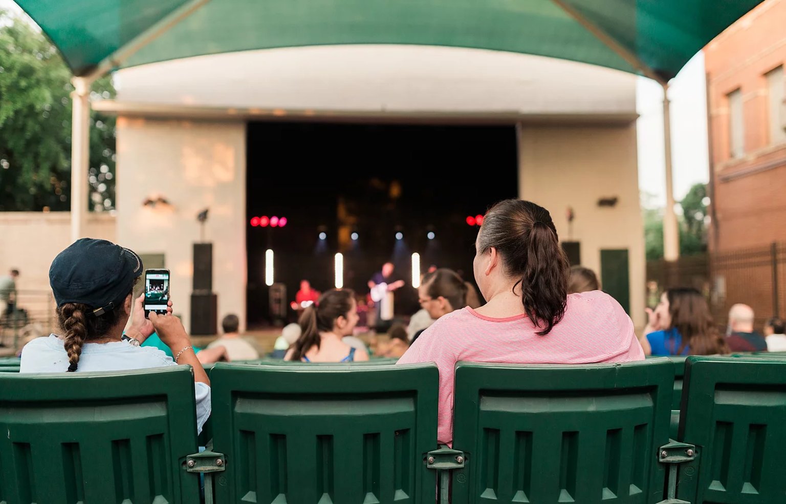People watching show at outdoor venue