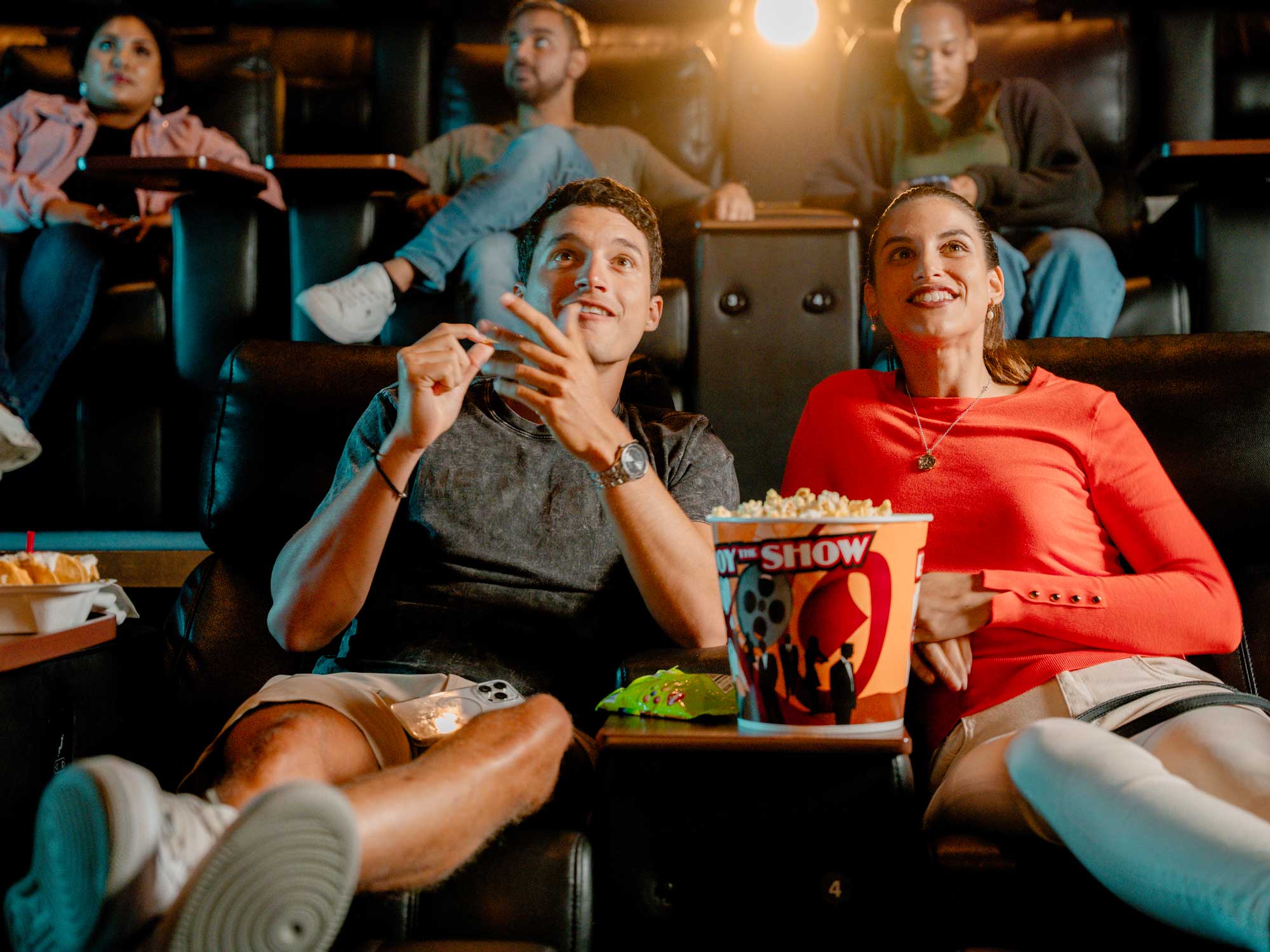 Couple sitting in movie theater