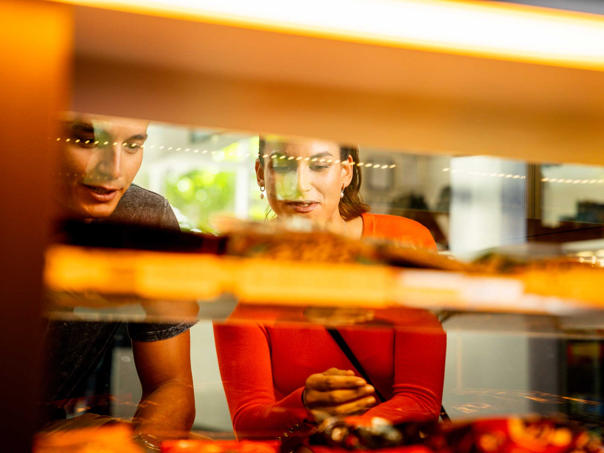 People looking in snack window