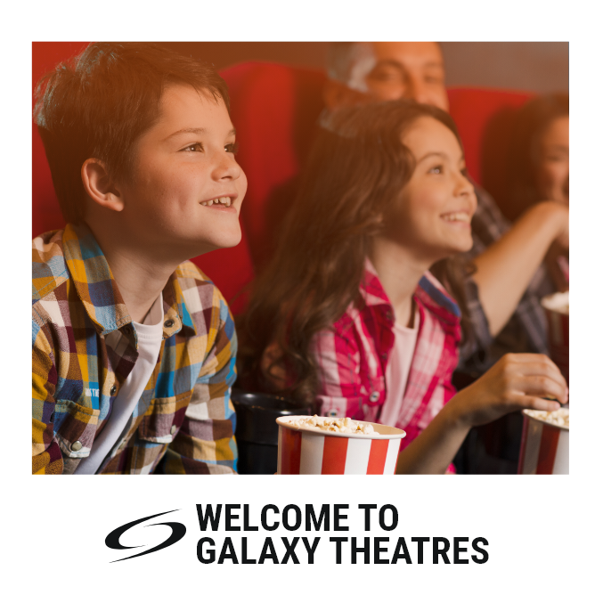 Kids smiling with popcorn