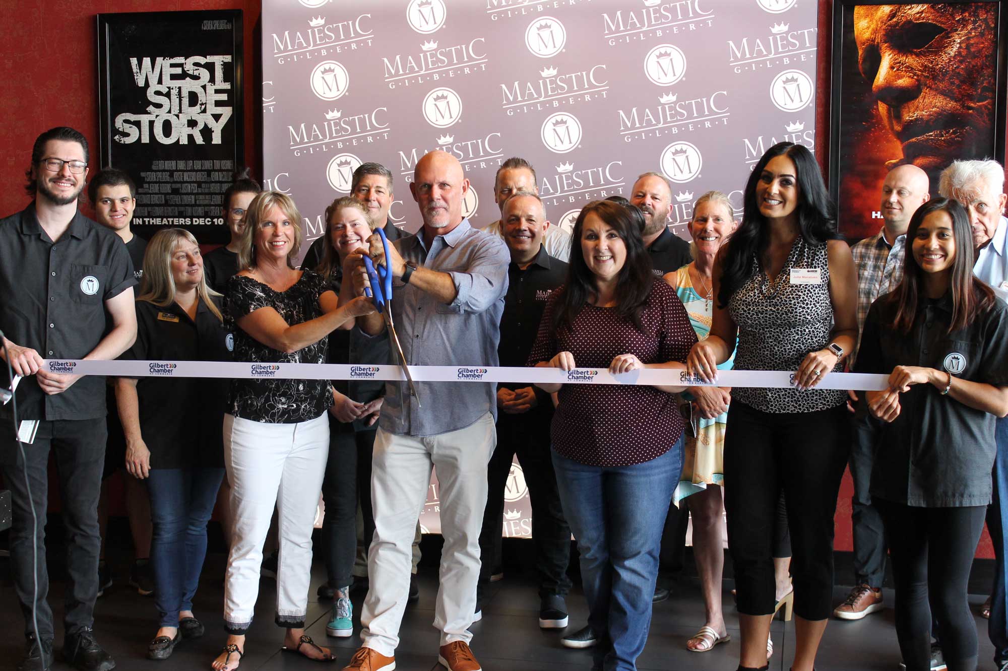 People at a ribbon cutting event at Majestic Gilbert
