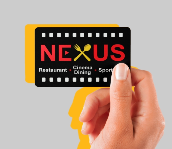 Hand holding a Nexus gift card