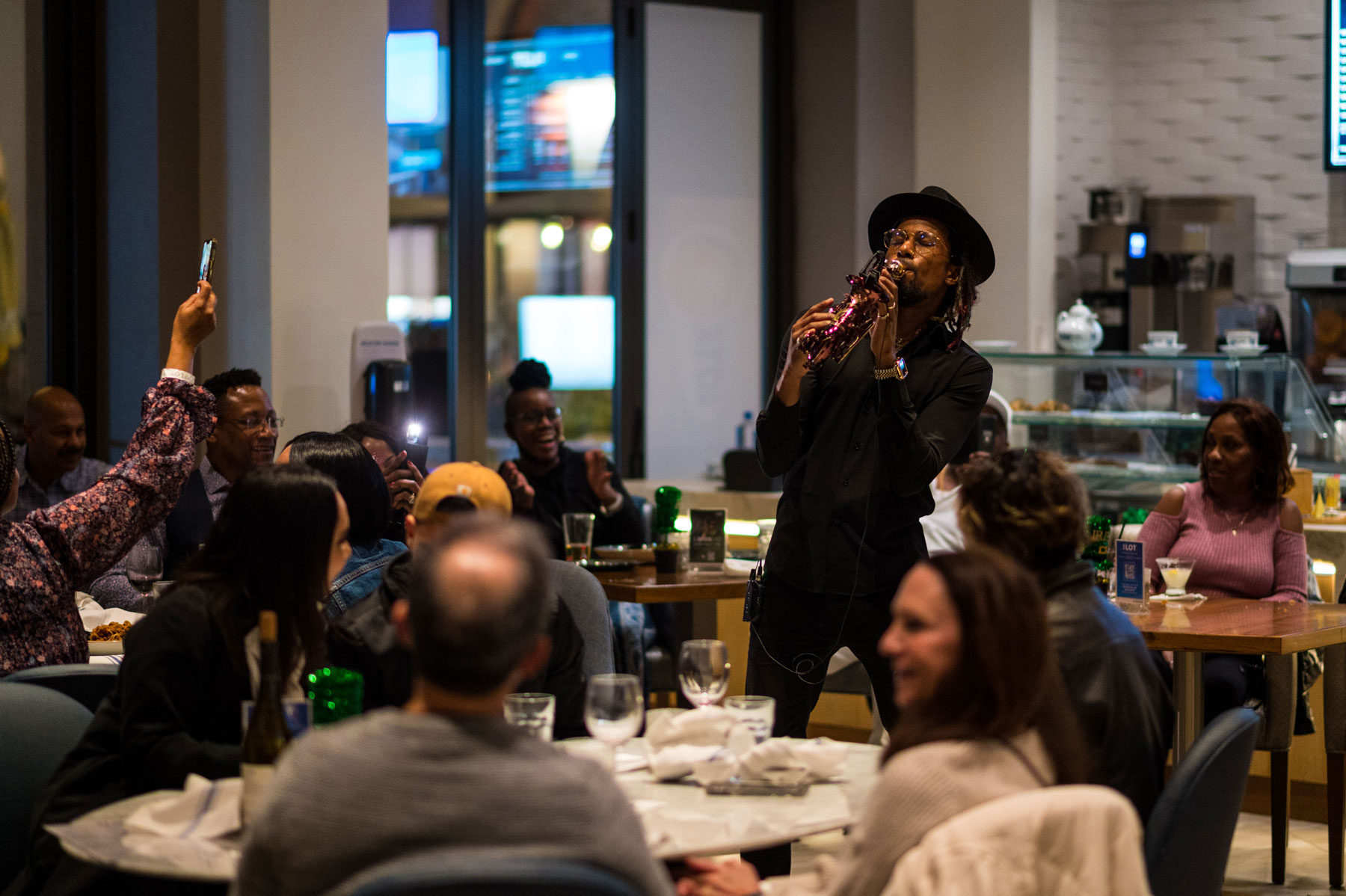 Saxophone player at event alt view