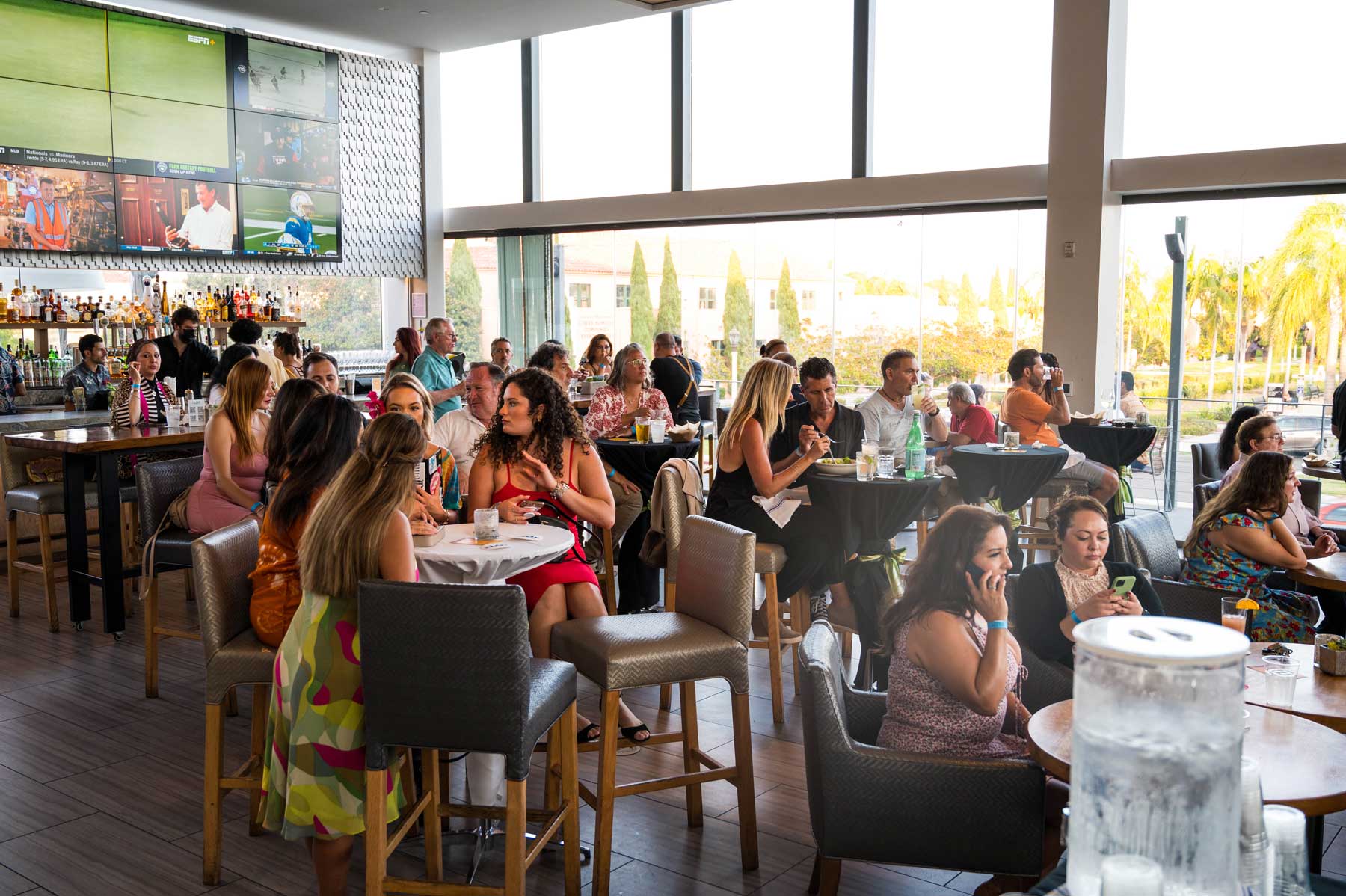 People sitting in dining room and bar