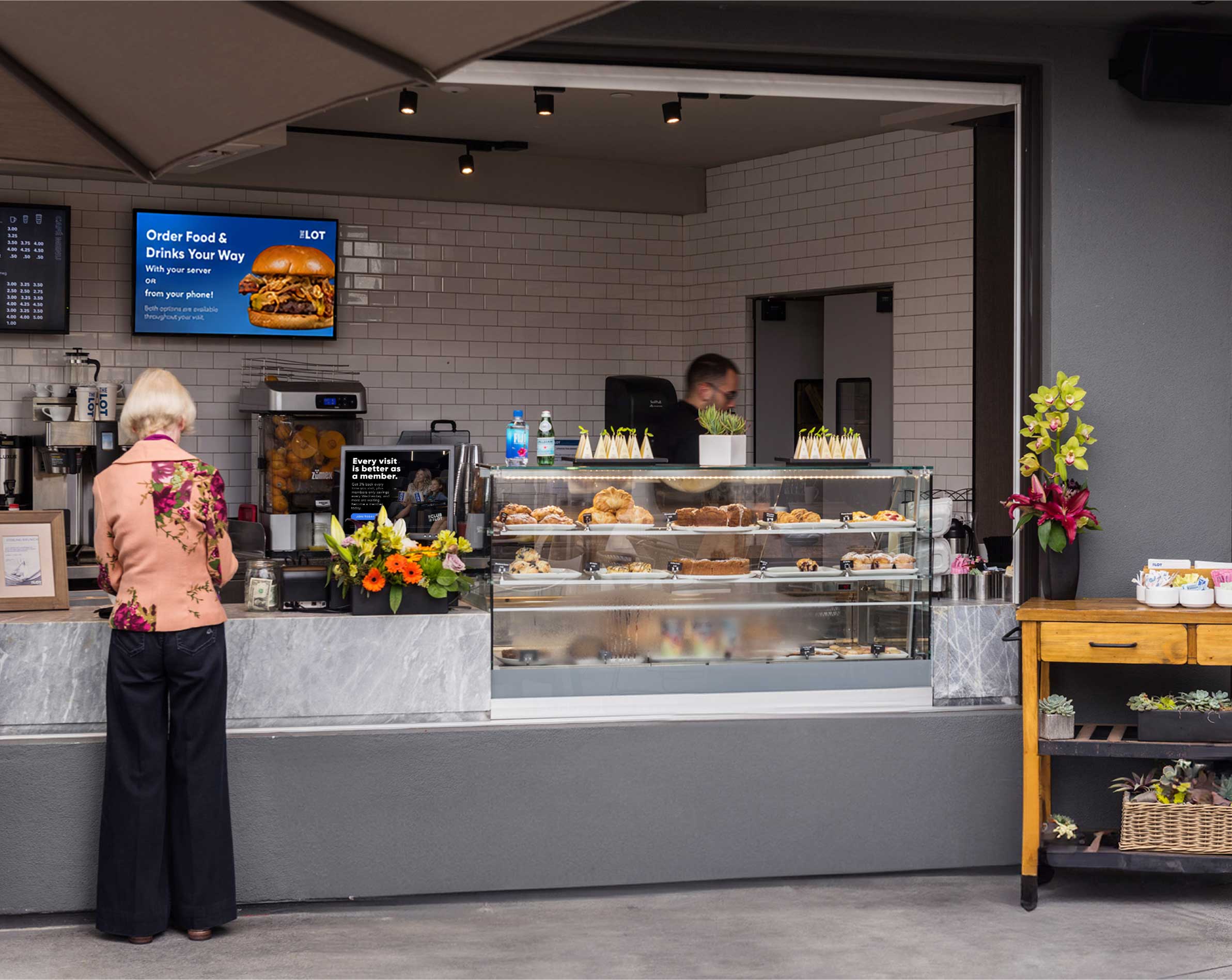Person ordering food from a cafe
