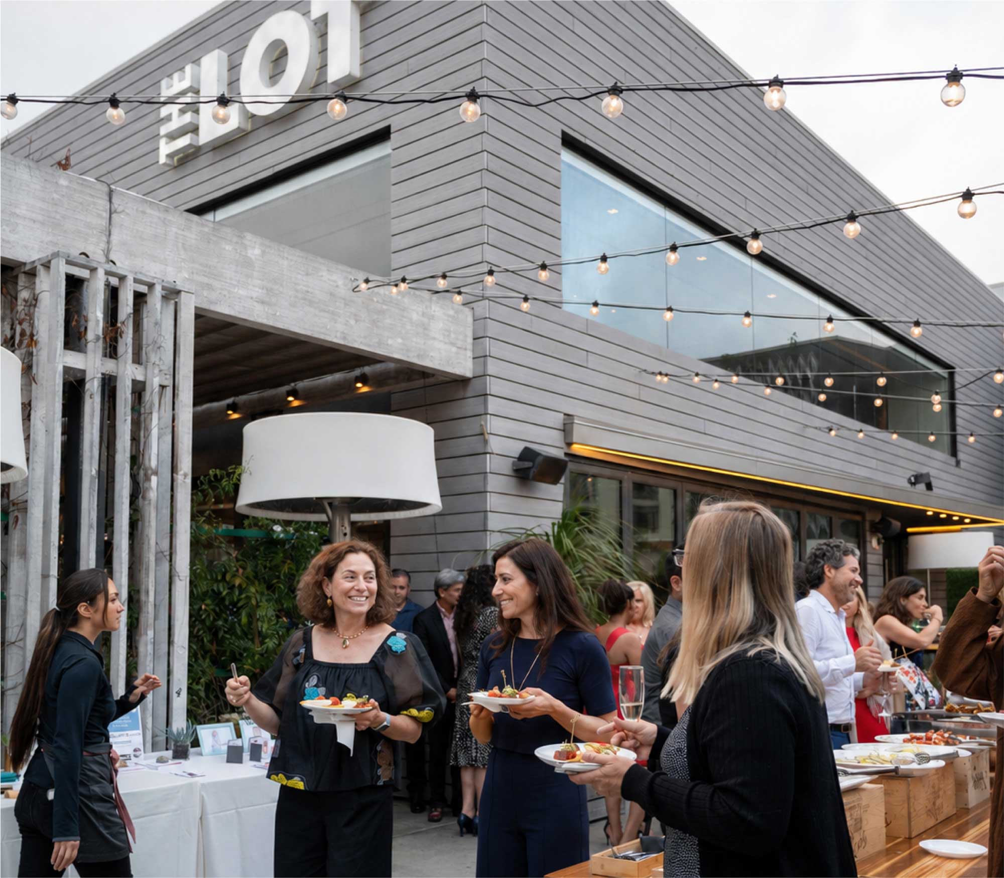 People at an event outside The Lot